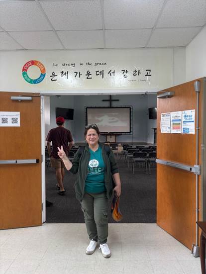 A person standing in a room with two doors

AI-generated content may be incorrect.